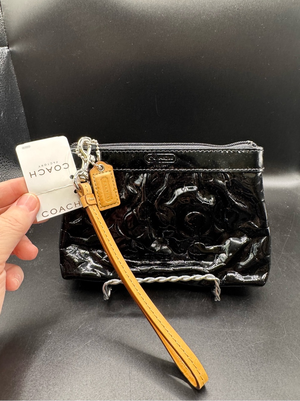 COACH Black Patent Leather Wristlet with Tan Strap